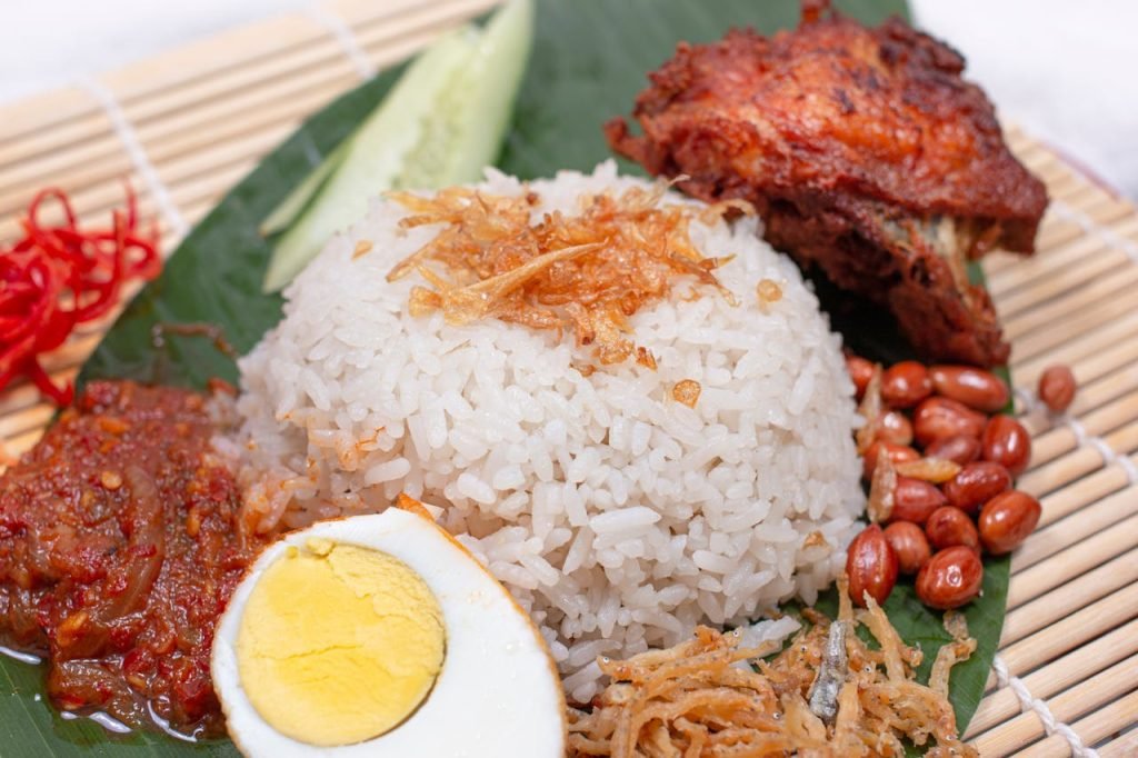 Top 10 Must-Try Street Foods in Kuala Lumpur - An image of Nasi Lemak Plate.