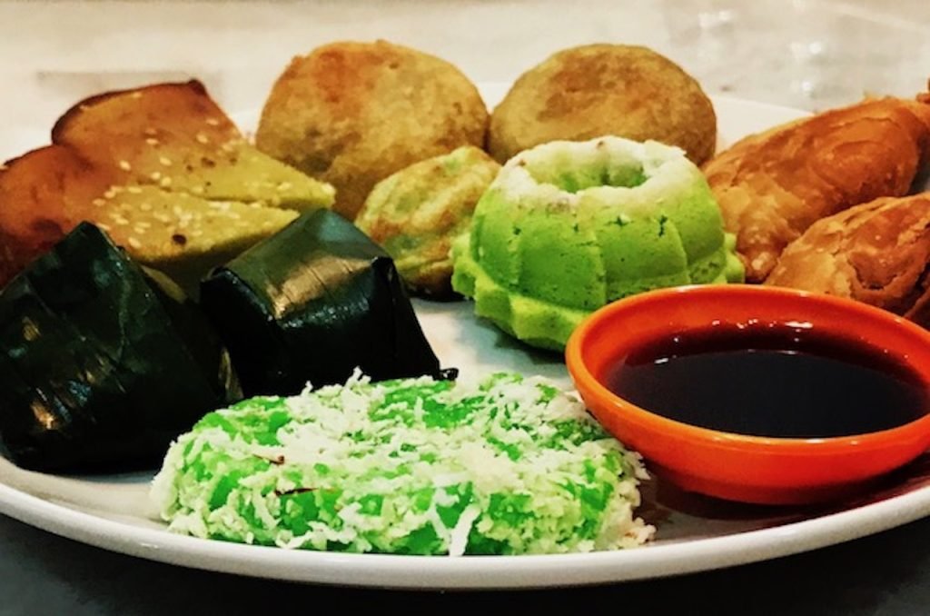 Top 10 Must-Try Street Foods in Kuala Lumpur - A plate of Malaysian Kuay meaning local sweets. 