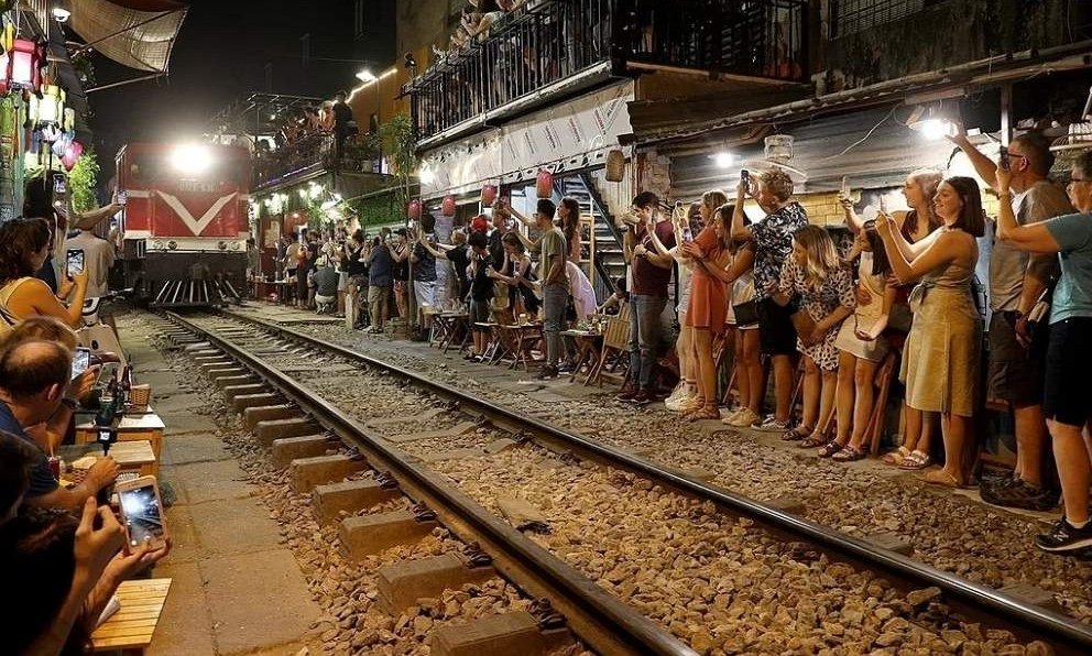 Hanoi Train Street: Ultimate Guide to Vietnam's Most Famous Railway (2025) - Safety is important while waiting for the train. 