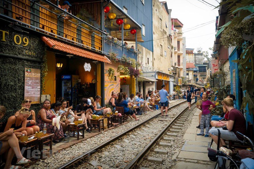 Hanoi Train Street: Ultimate Guide to Vietnam's Most Famous Railway (2025) - local cafe's at the train track. 